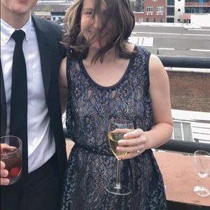 Blue lace sleeveless dress with nude slip